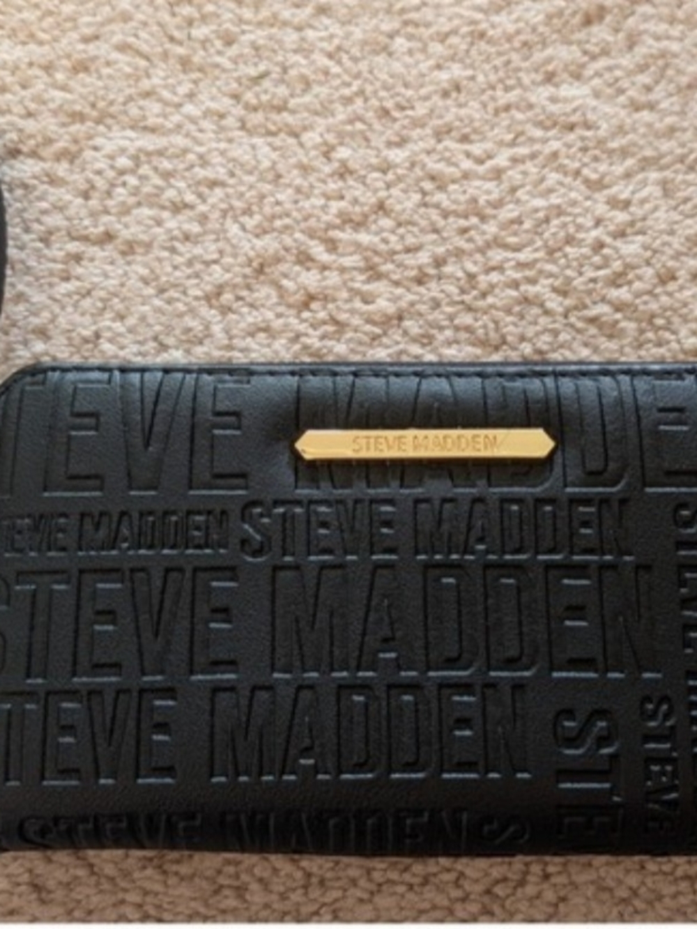 Steve Madden Black Embossed Logo Wristlet with Gold Branding